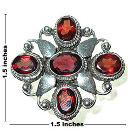 Sterling pin with garnet colored stones